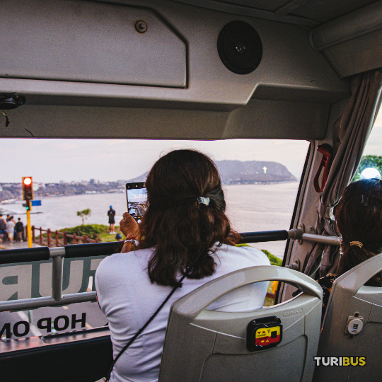 Tourists enjoying Turibus local offer
